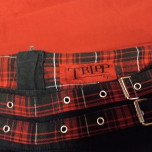 Two (2) tripp skirts one irreversible